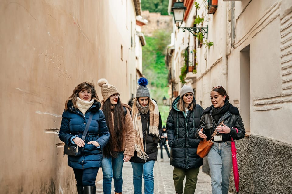 Granada: Albaicín and Sacromonte Guided Sunset Walking Tour - Mezquita Mayor de Granada and Islamic heritage markers on the way