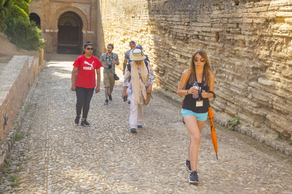 Granada: Alhambra Complex Guided Tour with Ticket - Carlos V Palace: the contrast that makes the complex feel bigger