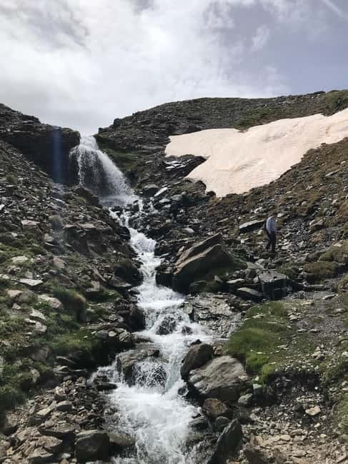 Granada: High Sierra Nevada Hiking Tour to 3000 Meters - San Juan Glacier Valley: waterfalls, shiny rocks, and that crystalline stream moment